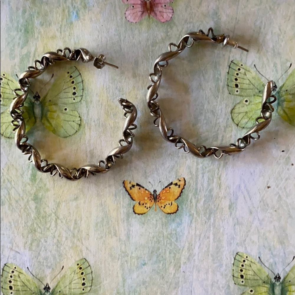 Earrings; Silver; Round twisted metal Hoop;